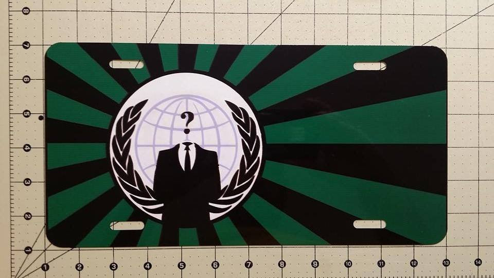 Anonymous Vanity License Plate Crest Green&Black Sunburst